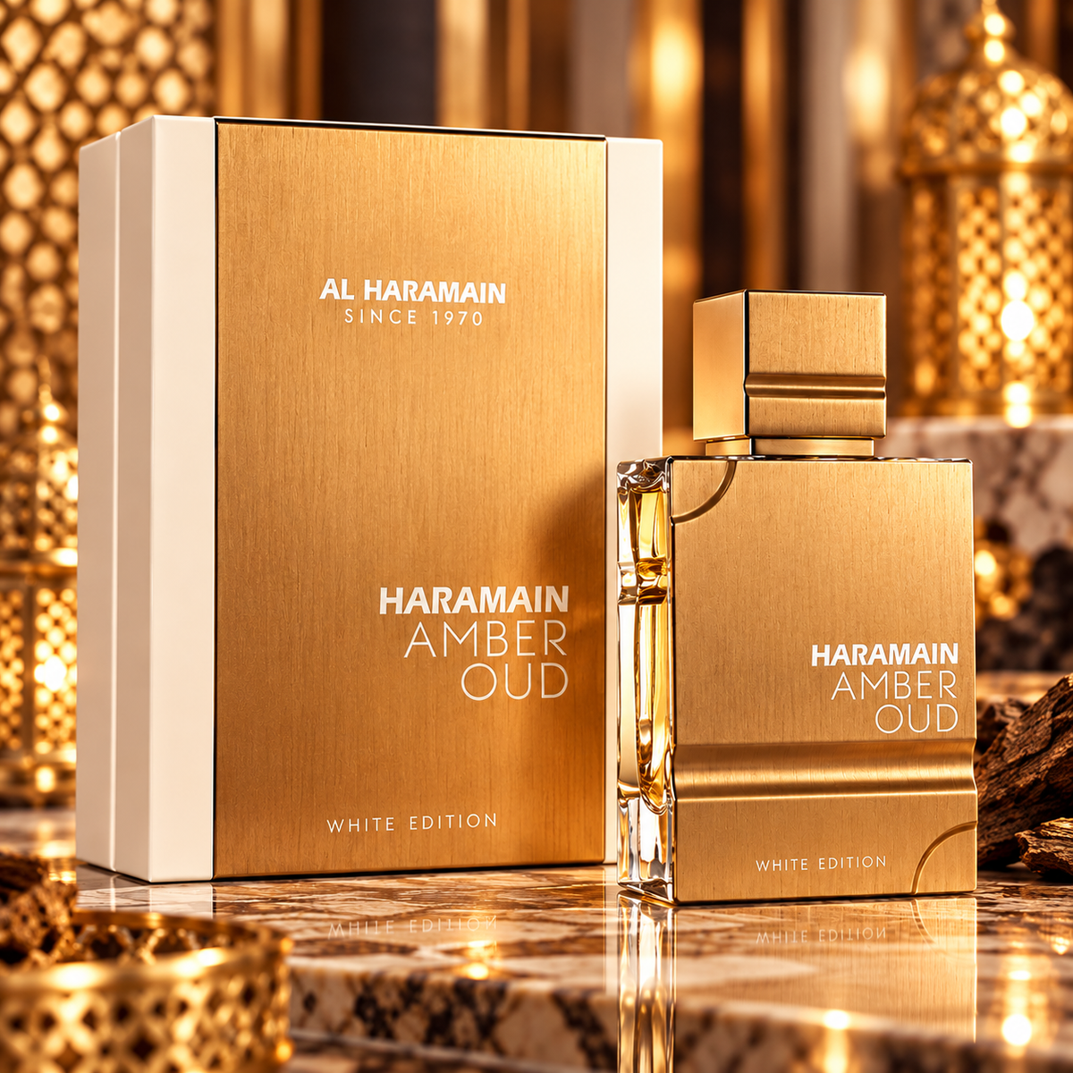 Al Haramain Amber Oud White Edition Eau de Parfum bottle and box in an elegant gold luxury setting