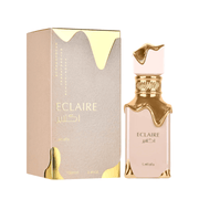 Lattafa Eclaire Perfume Spray, 100 mL (3.4 fl oz) bottle and packaging with gold accents, eau de parfum, fragrance packaging, body spray